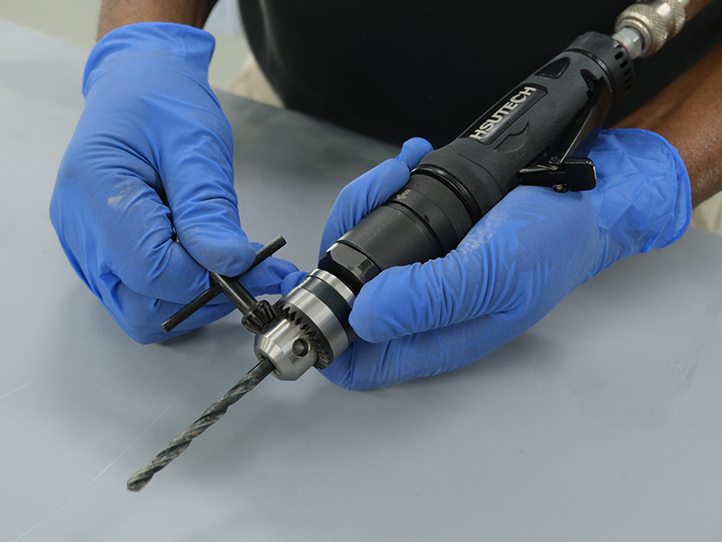 Hsutech Multi Tool Body 0.3HP pneumatic tool in use close up
